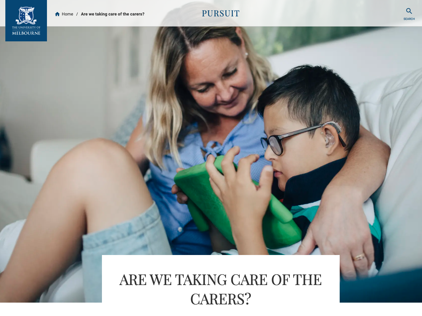 Woman helping young child to read
