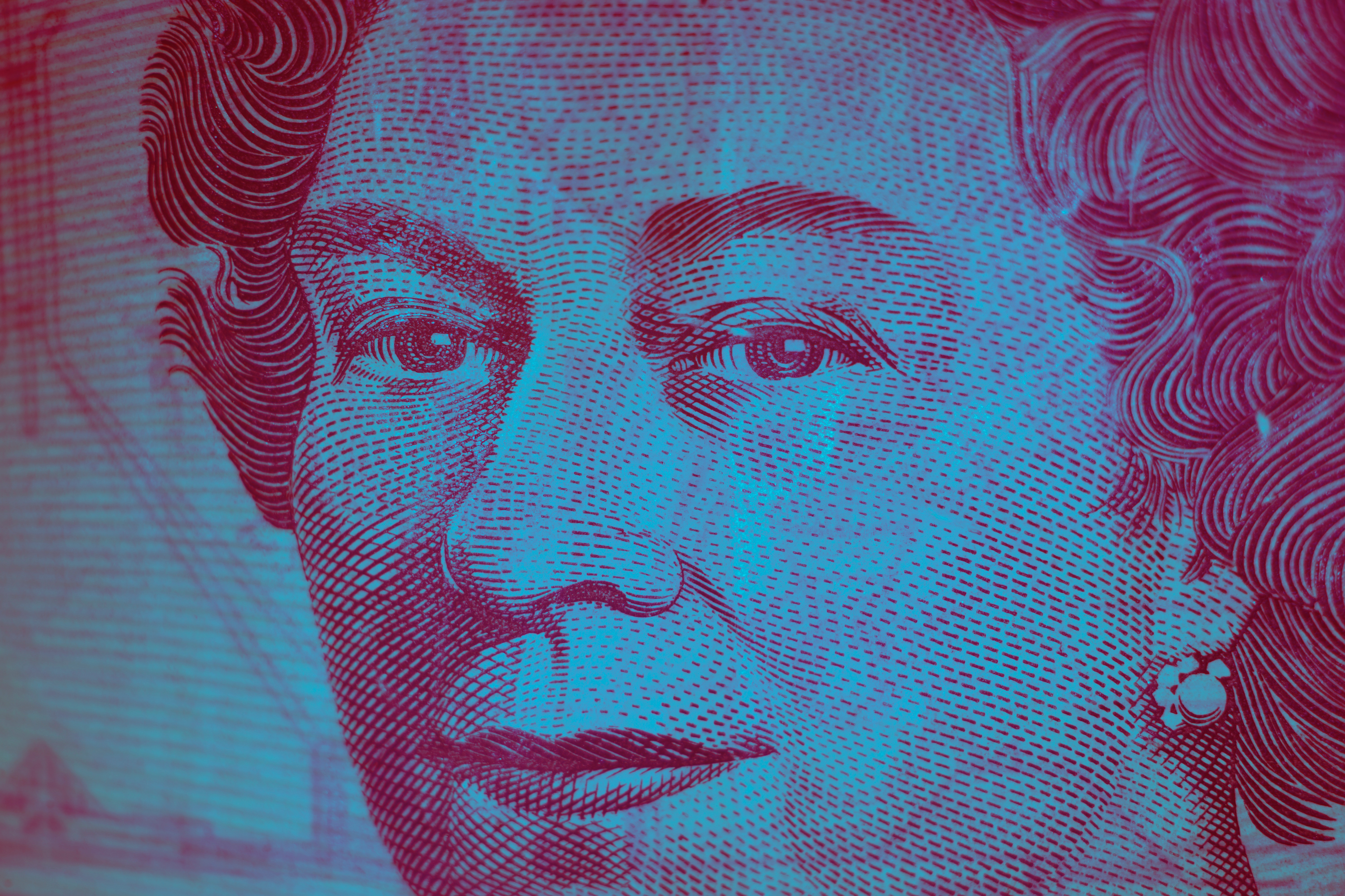 Close up of Queen of England's face on bank note